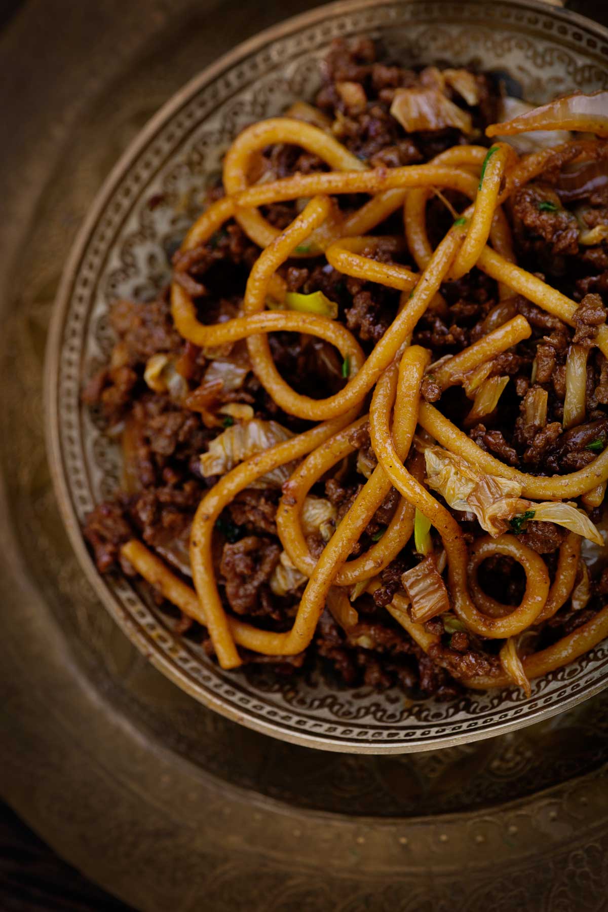 A humble plate of Hokkien egg noodles on a table.